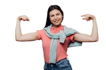 Young cute brunette dressed in pink t-shirt and turquoise sweater tied up over her shoulders, smiles happily, points at herself against transparent background, satisfied by her physical state