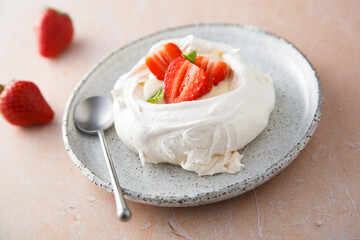 Traditional Pavlova dessert with fresh strawberry