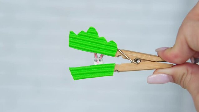 Children's craft made from paper and clothespins. step by step instructions from green paper. DIY concept. Step-by-step photo instructions