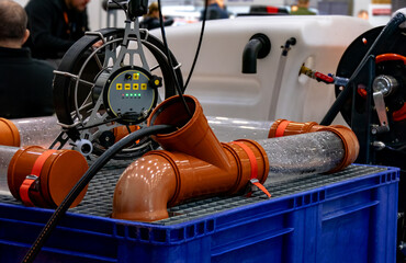 Equipment for cleaning sewage pipes with a mini camera.