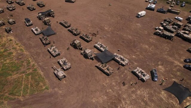 A field full of Israeli armour on the border ready for the Gaza ground offensive 