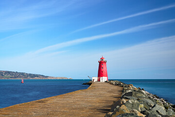 Lighthouse under the blue sky of Ireland