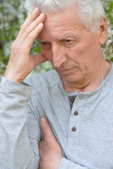 Close up portrait of unhappy senior woman