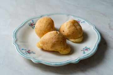 Freshly baked traditional Brasilian cheese bread balls
