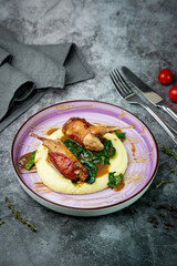  baked chicken wings with gravy, spinach and mashed potatoes top view
