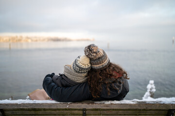 Winter Embrace: Loving Cuddle by Lake Constance (Bodensee) - Snowy Panorama with Snow-Covered Trees