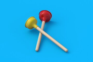 Red and yellow toilet plungers on blue background. Plumber tool. Professional equipment. Cleaning service. Pipeline unclog. 3d render