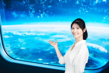 宇宙旅行を楽しむ若い女性