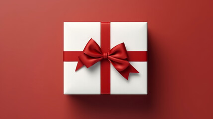 White Christmas gift box with red bow tie isolated on red background