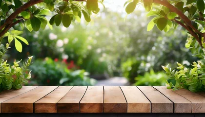 Poster empty wooden product display table top with blurred garden background nature scene podium © Nichole