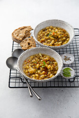 Warming white bean soup with mushrooms