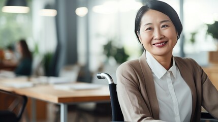 Businesswoman in a wheelchair in the office