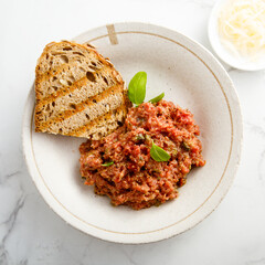 Traditional steak tartare with capers