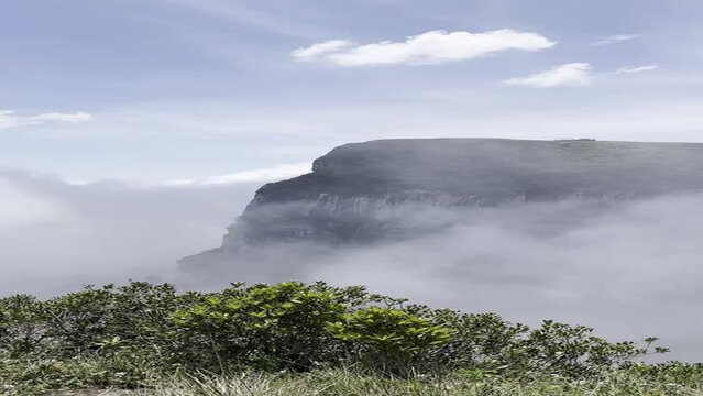 Mountain peak with clouds in Canion Fortaleza in southern Brazil in portrait mode