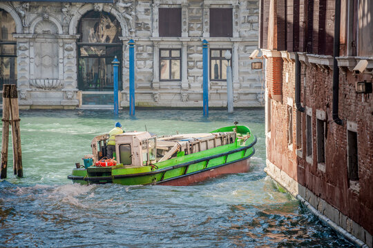 garbage boat at Venice Italy