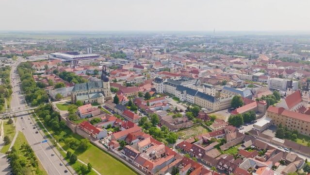 Trnava city with Saint Nicolas Church, Slovakia, Europe - Sunny Aerial Clip