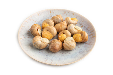 Grape (Burgundy) snails with butter and cheese isolated on white, side view