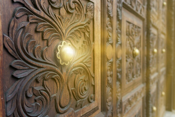 traditional swahili doors made of wood and brass