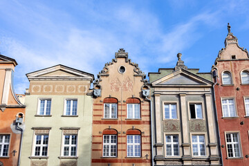 Fototapeta na wymiar Old historical colorful building architecture facade of Old Town in Gdansk. Traveling Europe in summer. Vacation concept
