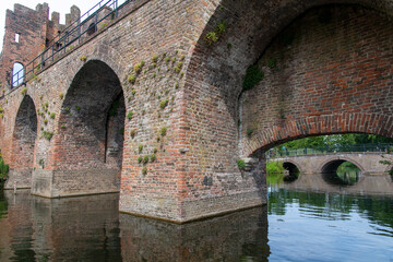 Close up of the medieval Berkel Poort or water gate and fortified wall of the city of Zutphen, the Netherlands