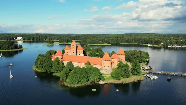 Trakai castle: medieval gothic Island castle, located in Galve lake, Lithuania. Trakai castle at summer, aerial view above the castle. Most beautiful and popular tourist Lithuanian landmark.