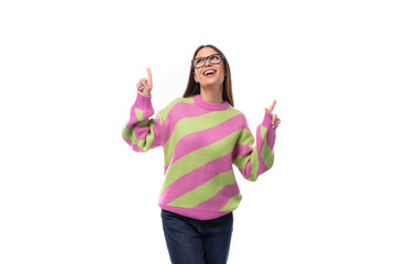 pretty dreamy 35 year old feminine model woman with glasses is dressed in a striped pink-green...