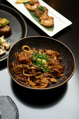 Japanese noodles with roast beef, close-up.