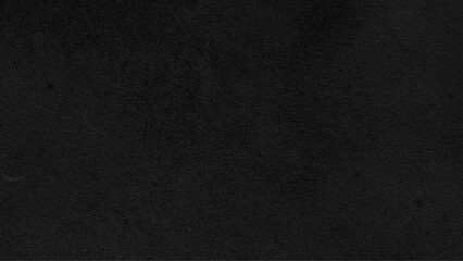 Dark cement wall in retro concept. Black concrete background for wallpaper or graphic design. Blank old plaster texture in vintage style. Abstract surface with unusual beautiful patterns.