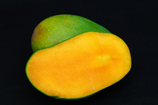 mango harumanis slice isolated on black
