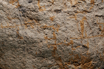 Brown stone texture, dark abstract background. Natural mineral rock close up details, empty backdrop with copy space for design