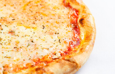 Margherita pizza. Close up view of a fresh pizza got out the wood fire oven with tasty curst. Margherita pizza Italian food on white background.