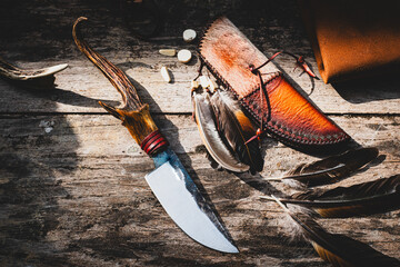 Frontier knife handle with horn and leather sheath is handmade in Thailand