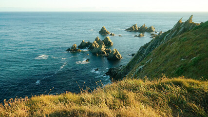 Decomposing fishing boat on an estuary off the Galician coast bathed by the Atlantic Ocean.