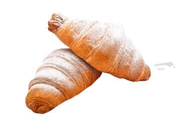 Croissants sprinkled with powdered sugar on top, isolated on white background