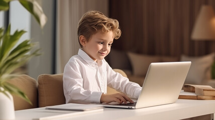 Smart Young Boy Researching Homework Topic from an Exercise Book on Laptop Computer. Happy schoolboy Browsing Educational Research, Chatting on Social Media, Studying School Material.
