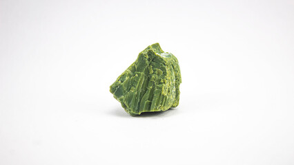 green mineral stone on a white background