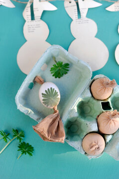 Easter eggs with mint and pantyhose beforedyeing