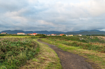 countryside landscape with cloudy sky