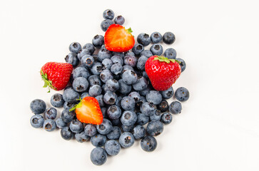 Strawberry and blueberries in white background