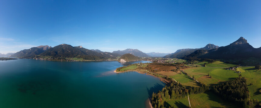 Austria, Salzburger Land, Strobl am Wolfgangsee, Drone view of lake Wolfgangsee and Blinklingmoos nature reserve