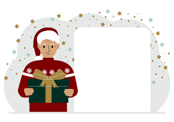 A man in a red sweater is holding a large gift box with a bow. New Year or Christmas.