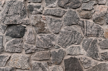 The texture of the wall is made of gray masonry.