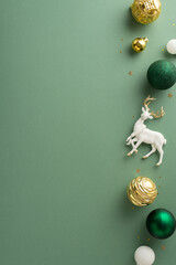 Magical New Year setting. Vertical top view capturing deluxe baubles and festive reindeer. Gold...