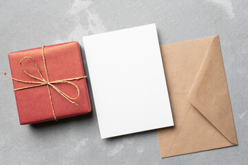 Blank card mockup with envelope and gift box
