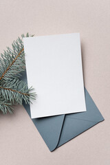 Card mockup with christmas fir tree and envelope