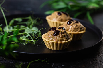 Dough tartlets with pate, mushrooms and salmon
