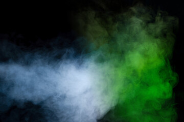 Green and white steam on a black background.