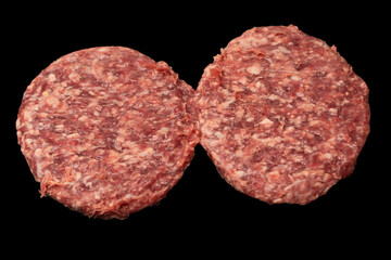 Raw minced beef isolated on a black background.