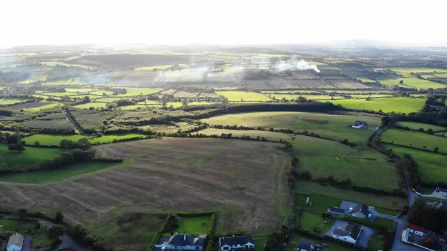 Aerial of a green fields at a farm