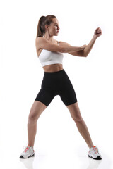 Fitness woman working out, studio shot.